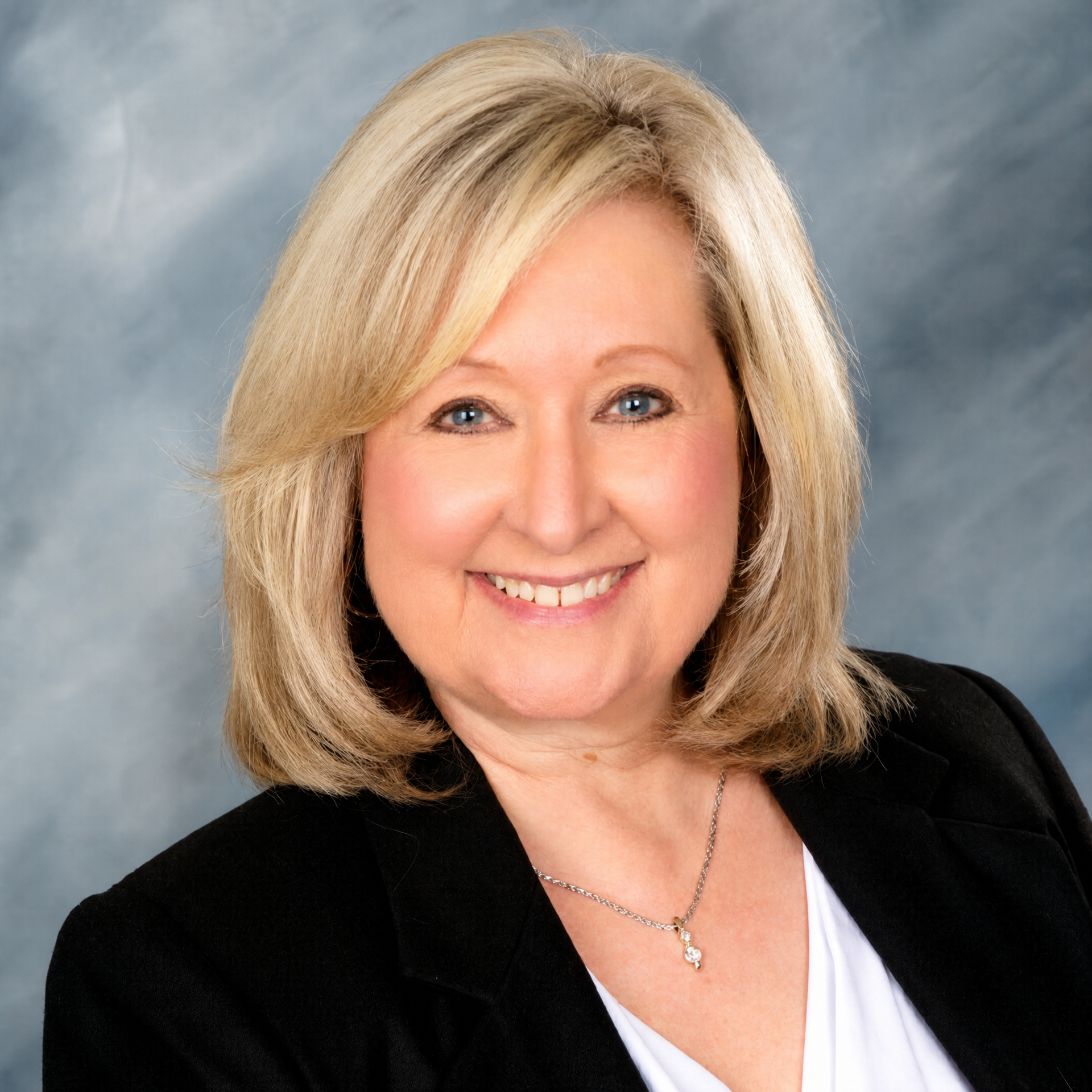 Professional headshot of Mary Gustafson